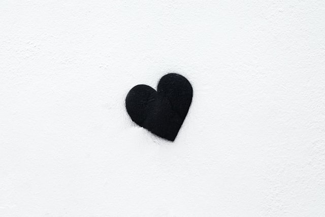 A black heart representing black lives matter. and Living with love.